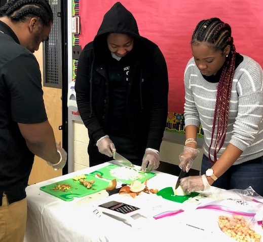 Students from South Philadelphia High School participating in a food prepration
